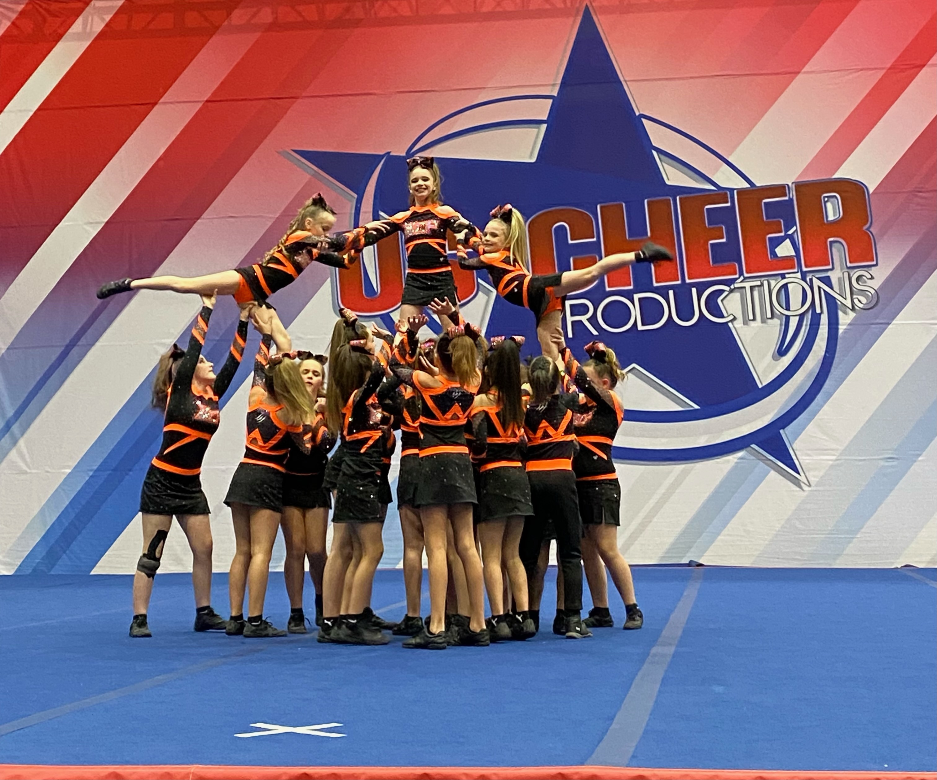 Cheer team doing a pyramid