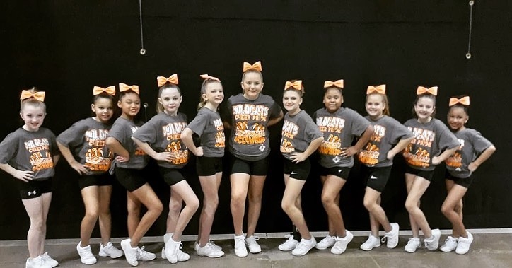 Picture of cheerleaders in tshirt and shorts